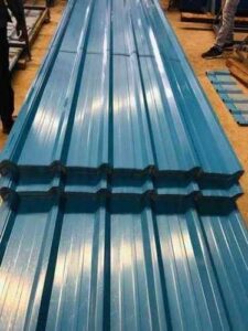 Premium industrial roofing sheets reducing maintenance costs in modern factory and warehouse buildings.