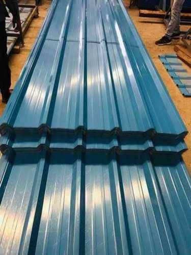 Premium industrial roofing sheets reducing maintenance costs in modern factory and warehouse buildings.