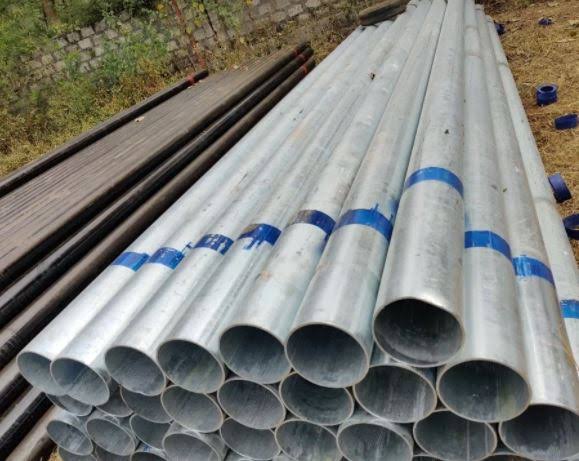 Tata GI Pipes installed in modern infrastructure, industrial construction, commercial buildings, and water distribution projects.