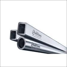 Structural steel pipes used in prefabricated industrial building and warehouse construction projects.